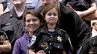 Tulalip Tribal Police Chief for a Day with young Autistic girl home page image for video still.